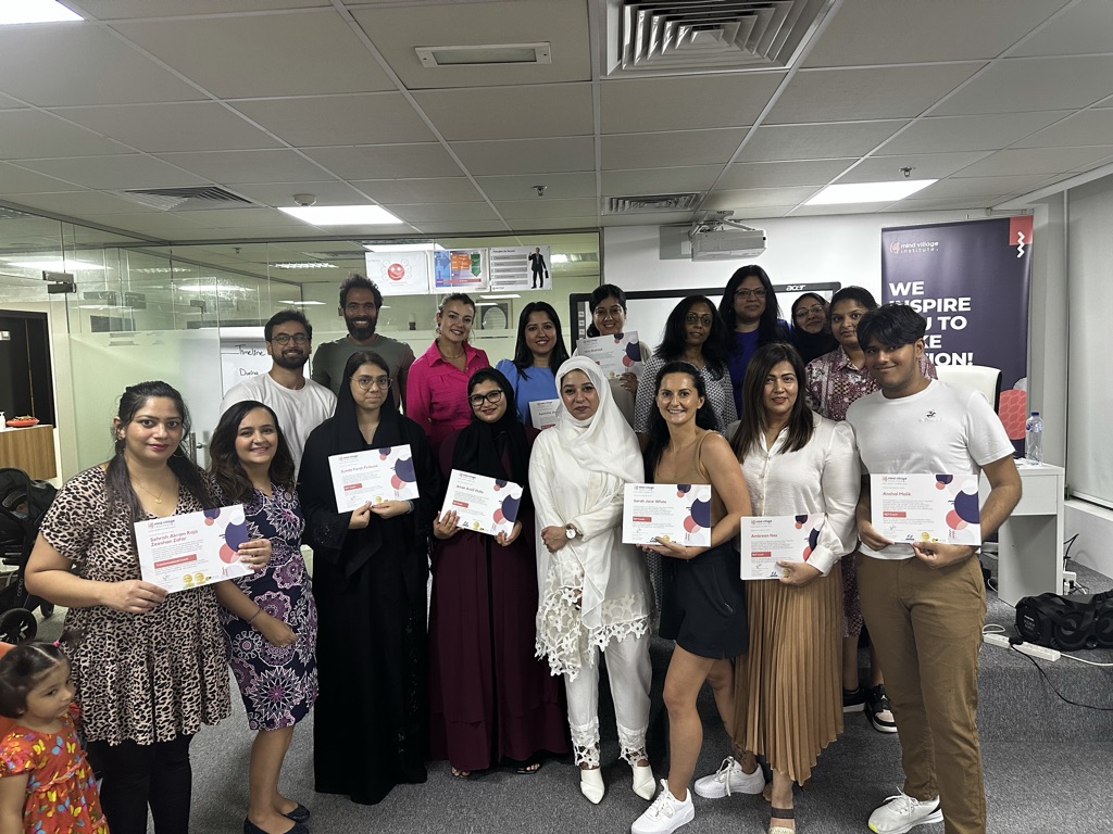 Group of certified Mind Village students holding certificates